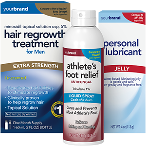 Packaging of 5% minoxidil hair regrowth treatment for men alongside athlete's foot antifungal spray and personal lubricant products