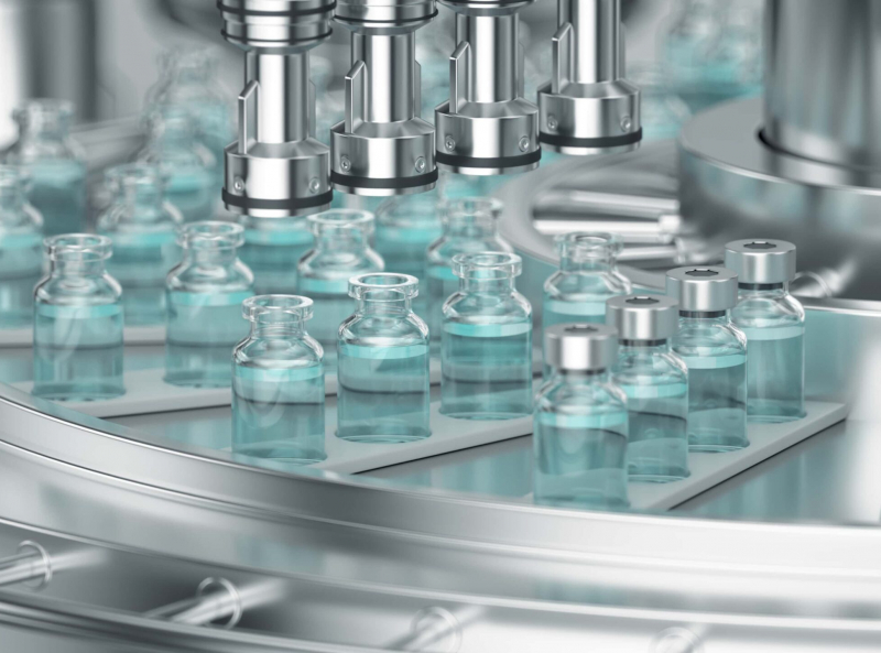 Automated pharmaceutical vial filling machine in GMP peptide manufacturing facility