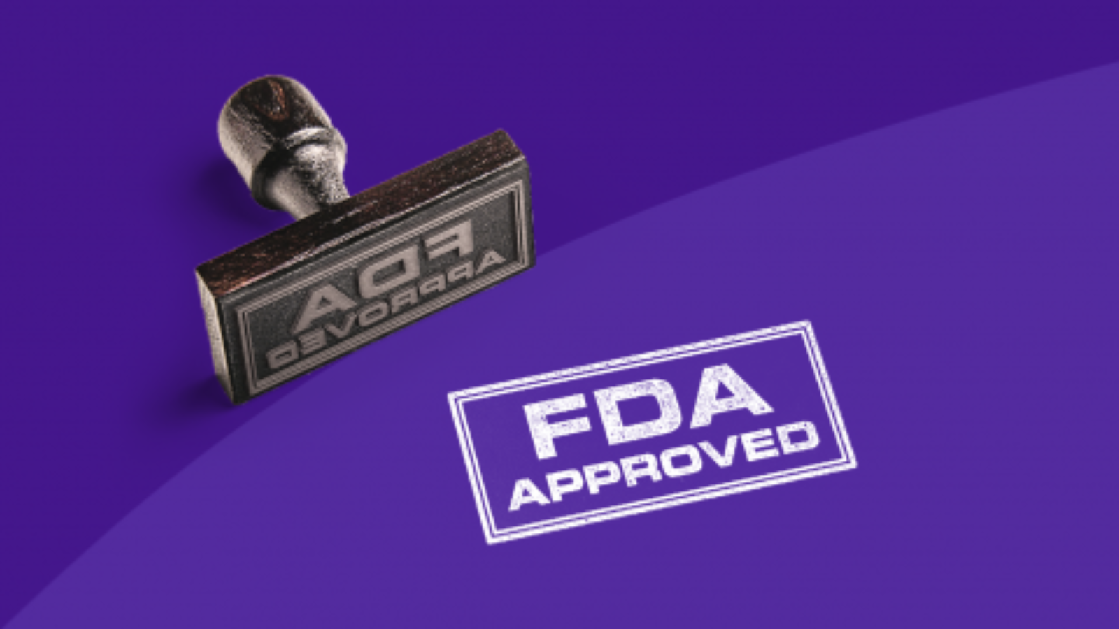 FDA approved rubber stamp on purple background
