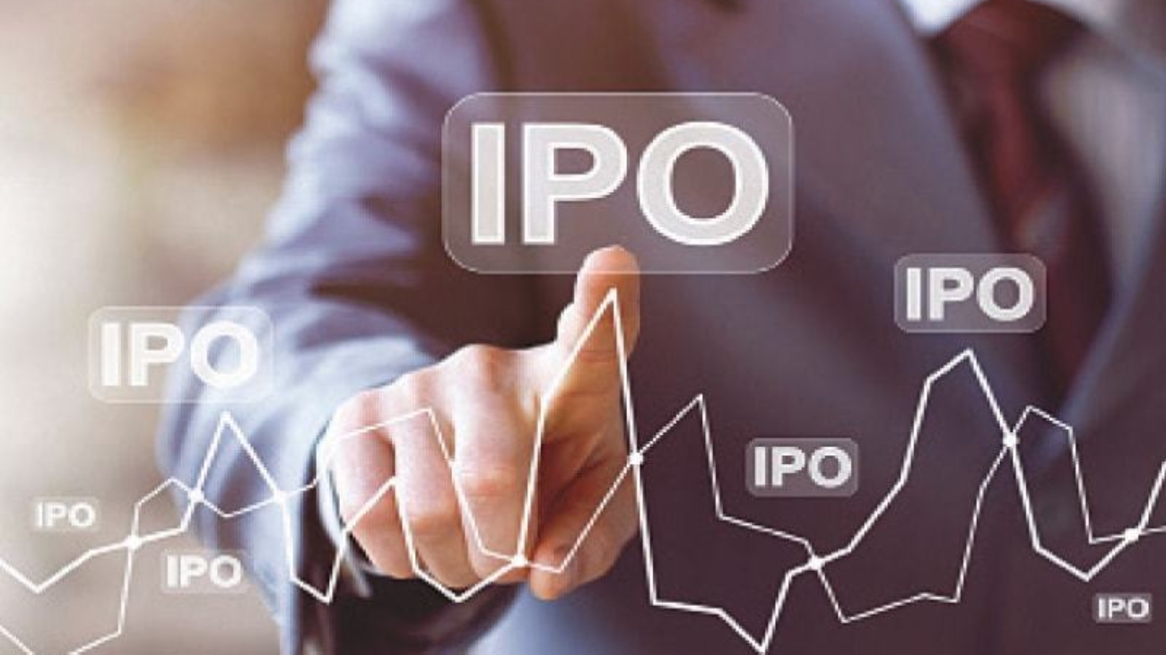 Businessman pointing at floating graphical IPO stock market chart